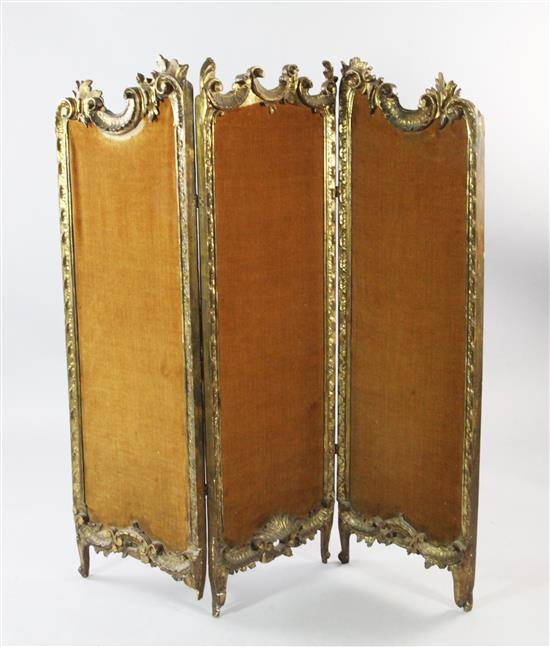 A low Louis XV style carved giltwood three fold screen, H.4ft 1in.